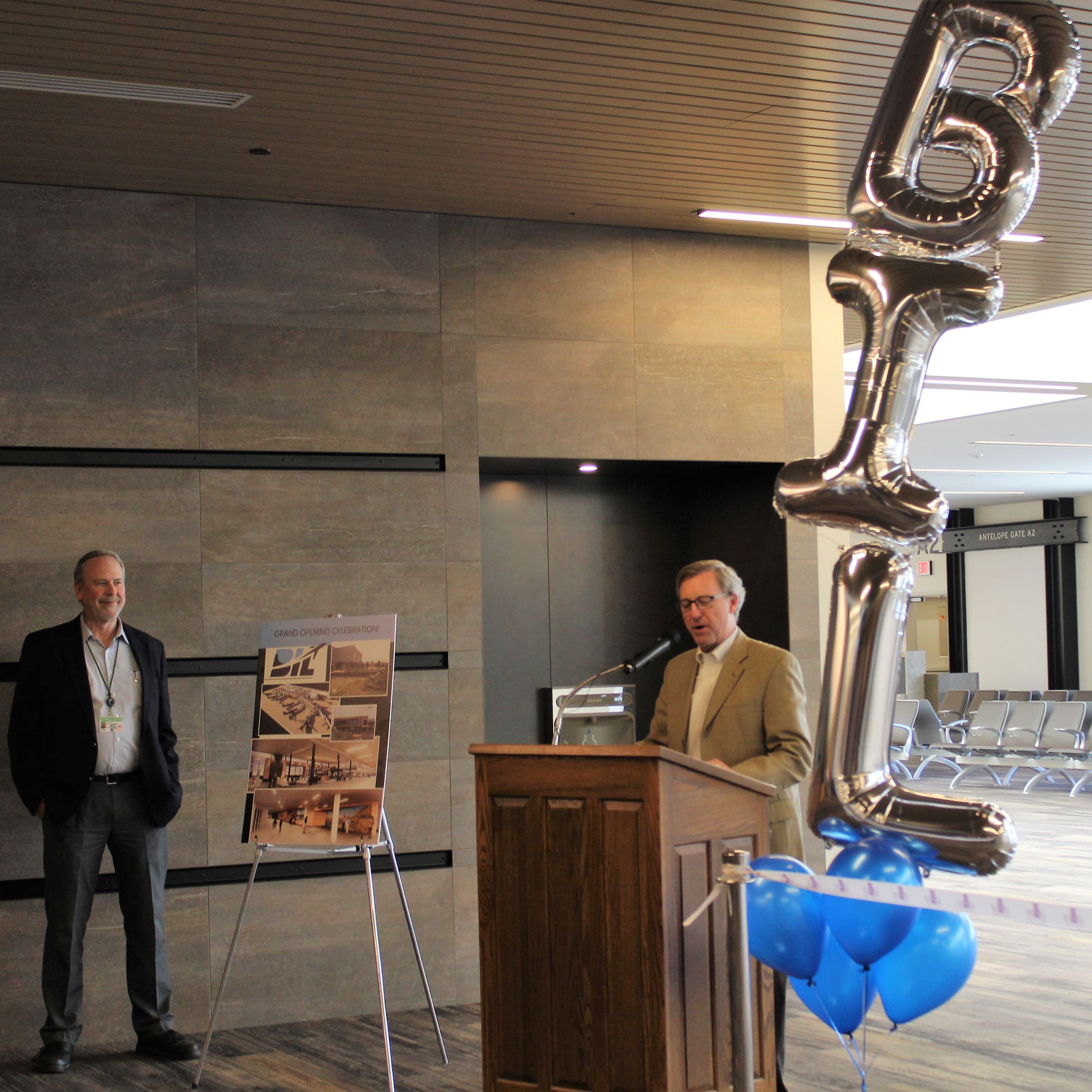 Mayor Cole and Aviation Director, Ploehn, at 2022 Ribbon Cutting 